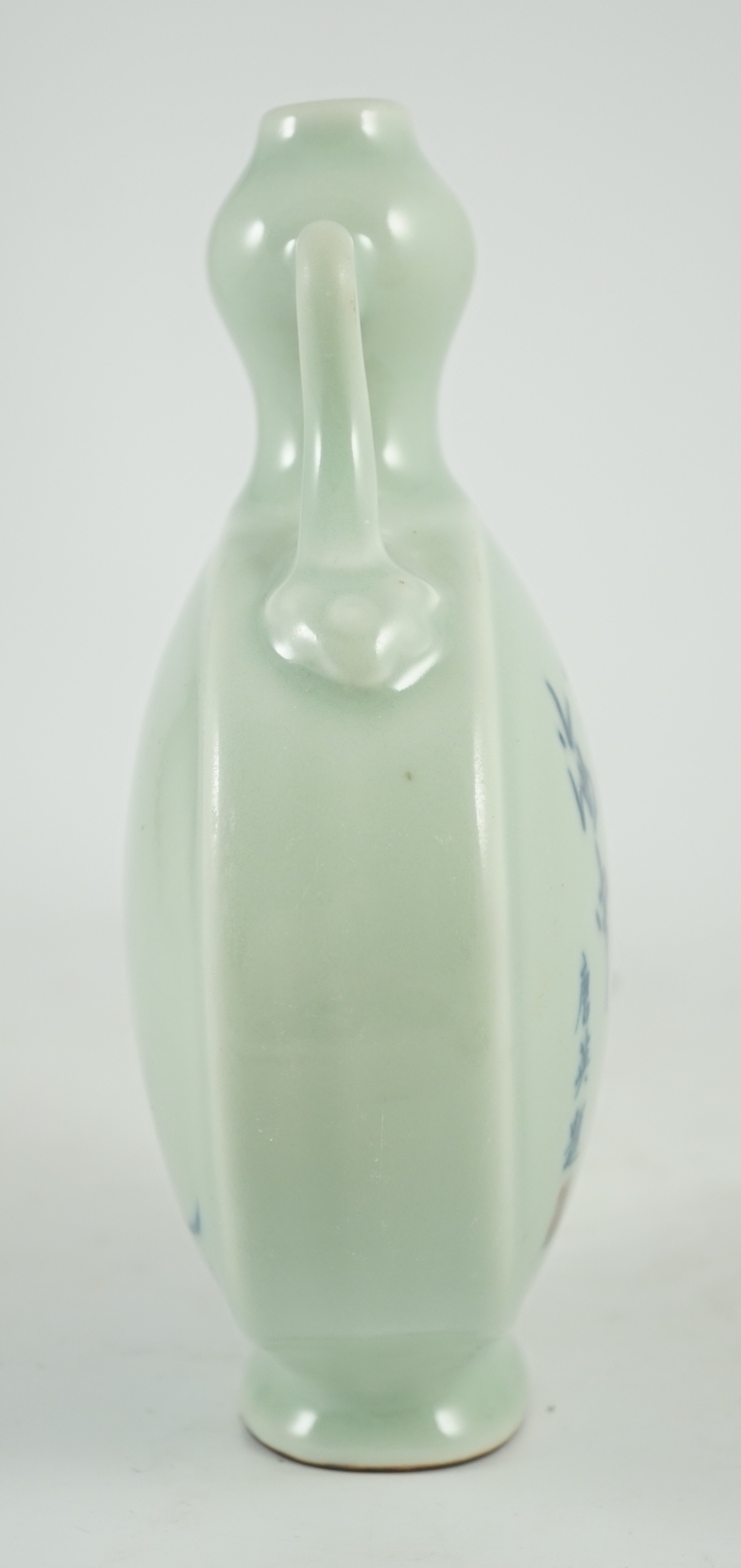 A Chinese underglaze blue and copper red inscribed celadon ground moonflask, 21cm high